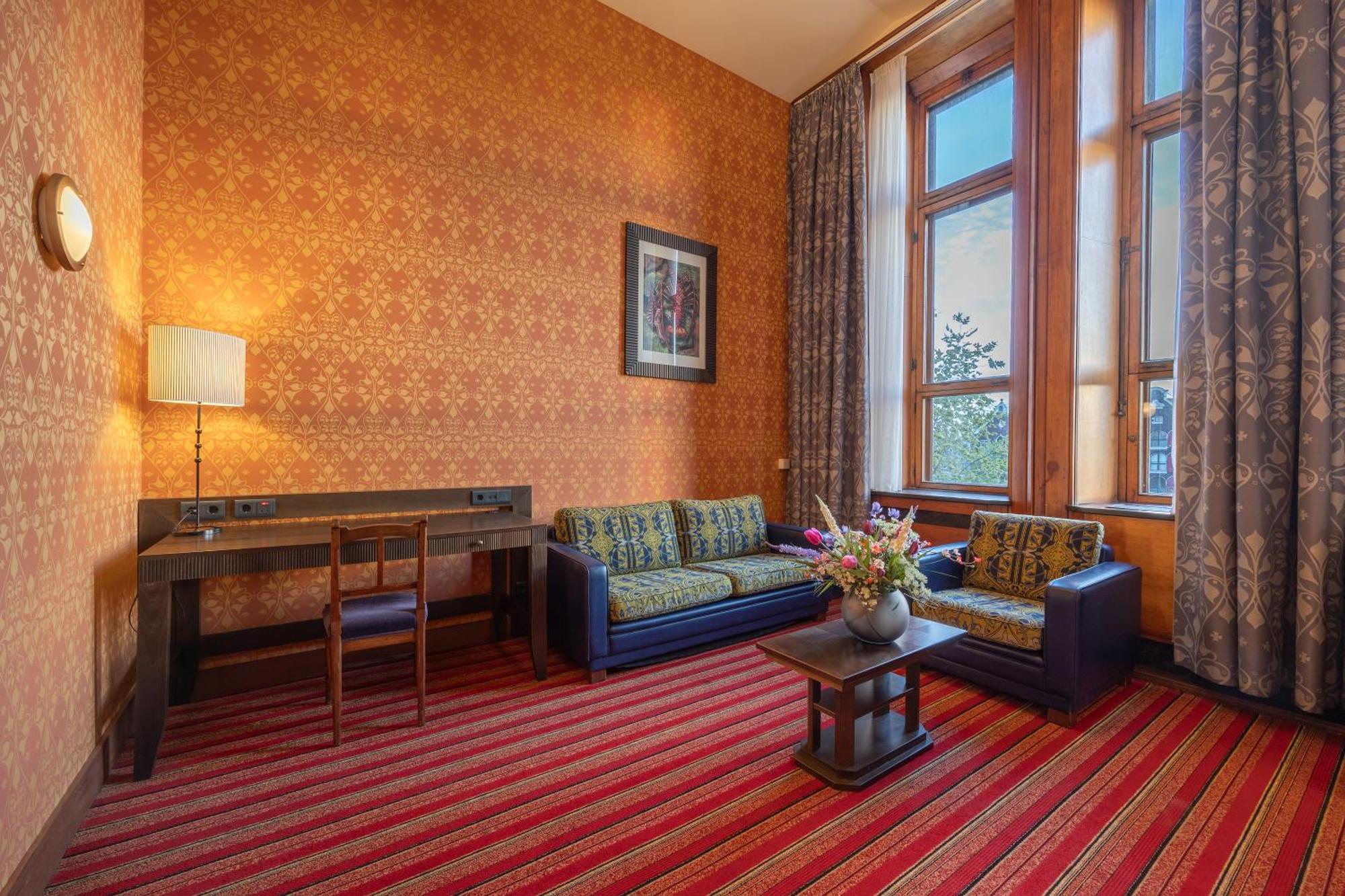 Grand Hotel Amrath Amszterdam Kültér fotó A suite at the Hotel de la Ville