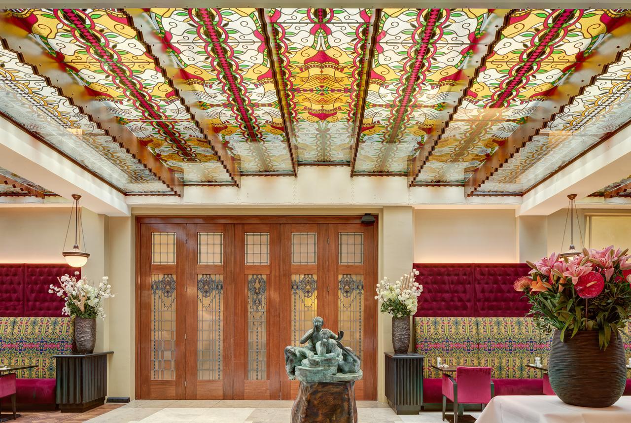 Grand Hotel Amrath Amszterdam Kültér fotó The ceiling of the lobby